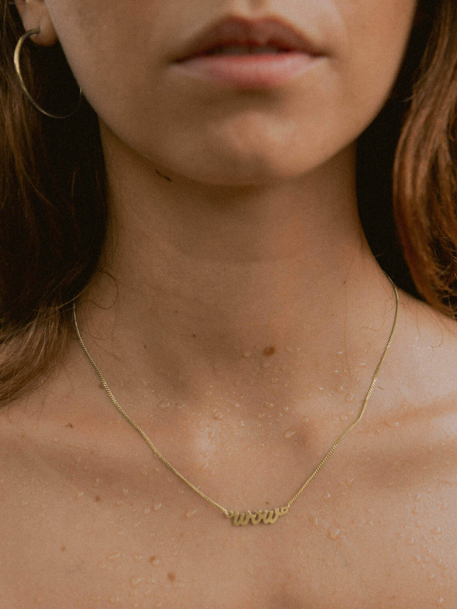 Kettenanhänger WOW Vergoldet 